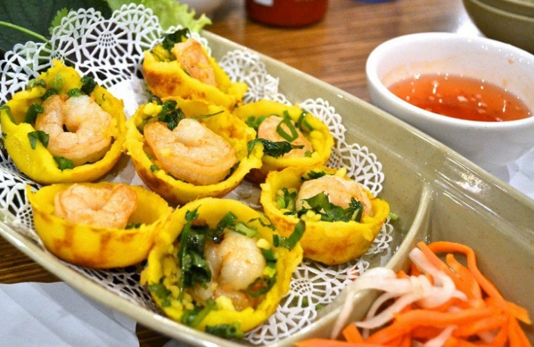Eating Banh Khot in Vietnam