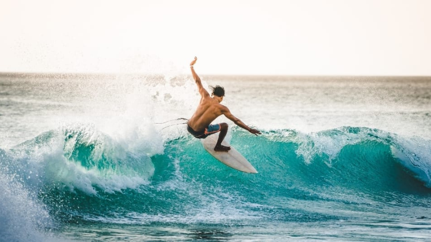 Surfing at Santorini's Beach