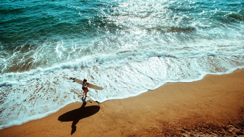 Surfing at Santorini's Beach